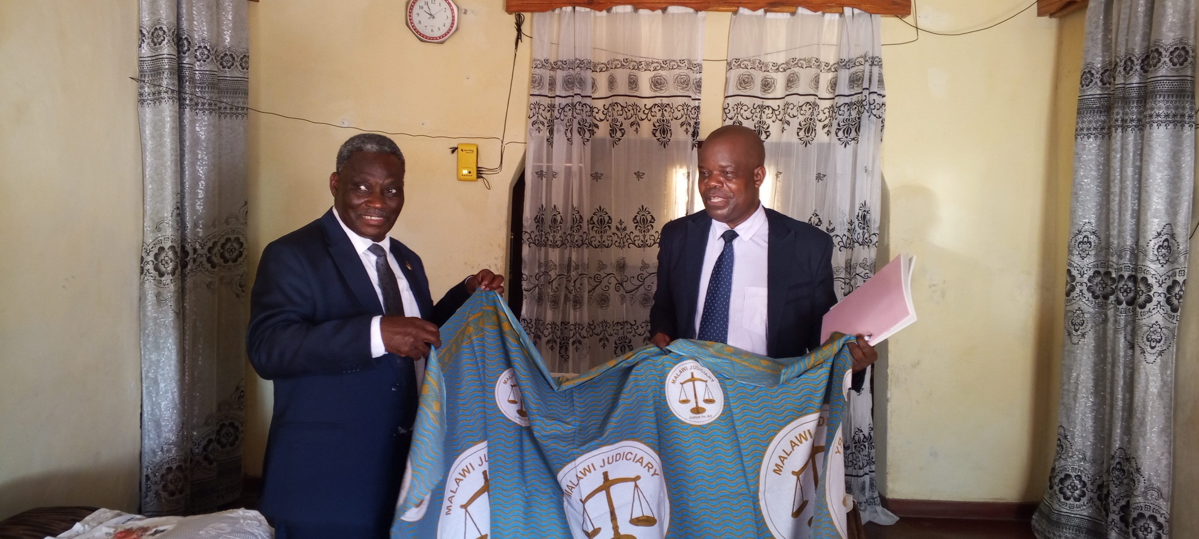 The Honourable the Chief Justice with His Worship Victor Sibu, retired Second Grade Magistrate