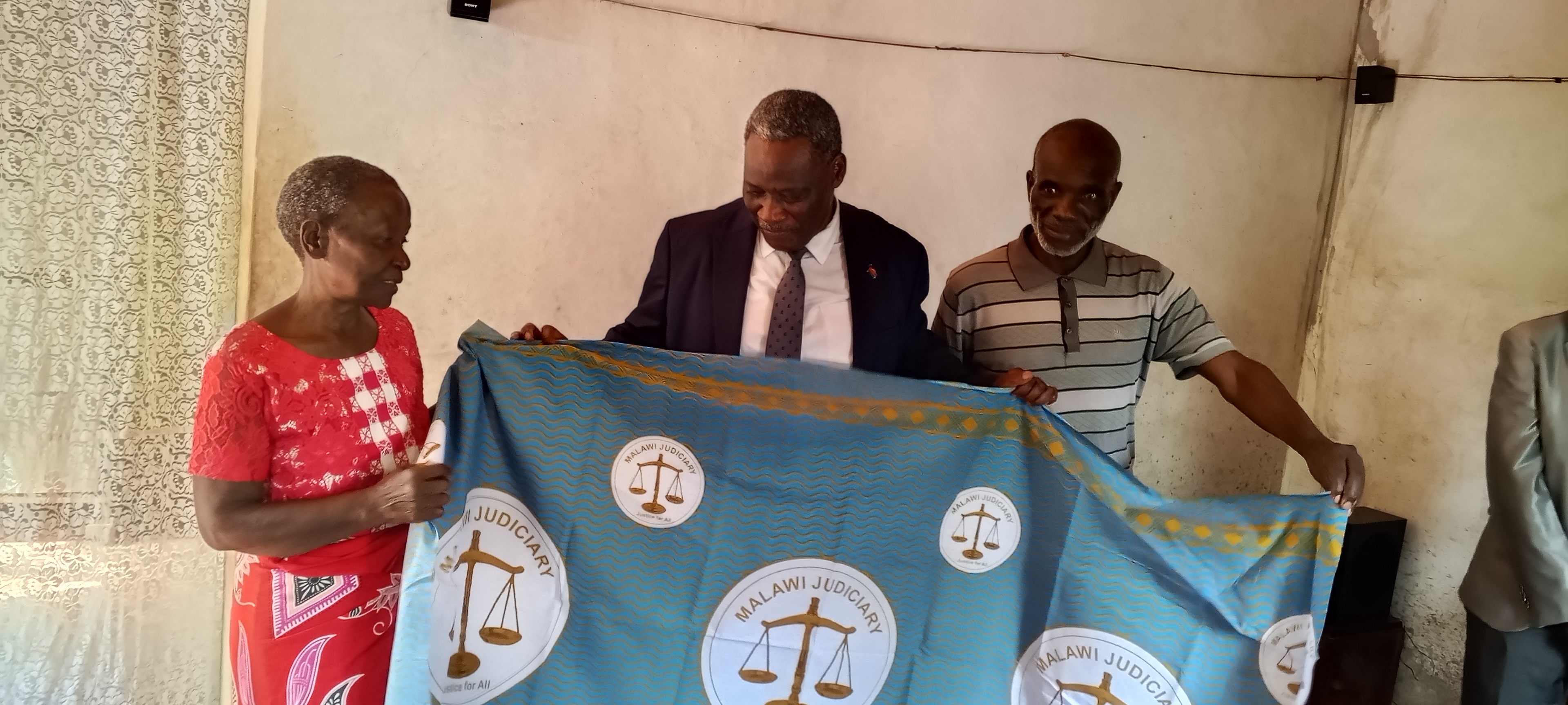 The Honourable the Chief Justice with Ms Loice Chirombo, retired Copy Typist